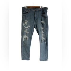 Levi's Relaxed Fit Blue Jeans with Distressed Details
